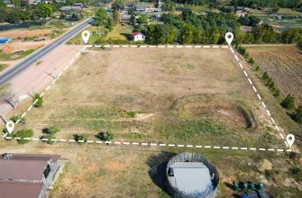 land plot building house aerial view land field with pins pin location housing subdivision residential development owned sale rent buy investment home house expand city suburb 1